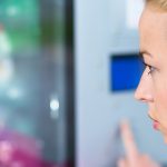 Woman at vending machine